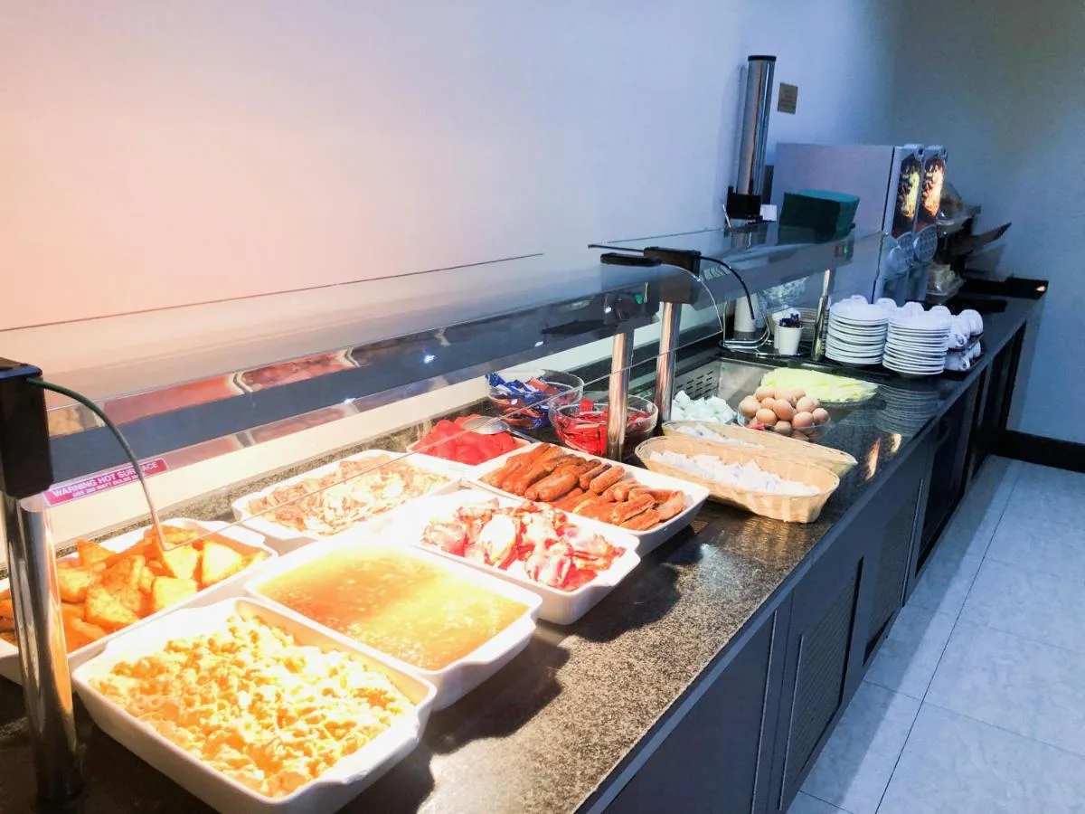 a buffet line with many different types of food at Park Avenue Bayswater Inn Hyde Park in London